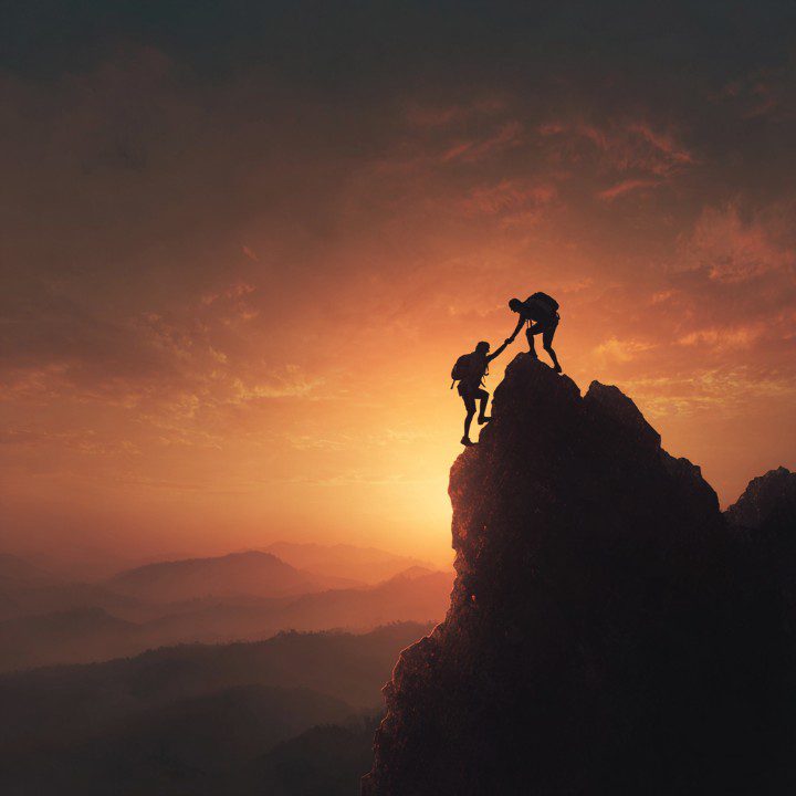 Climb Together to Find your greater Purpose-mountain-climbing-teamwork-sunrise
